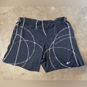 Men’s vintage Nike shorts. Added barbed wire one of a kind shorts.